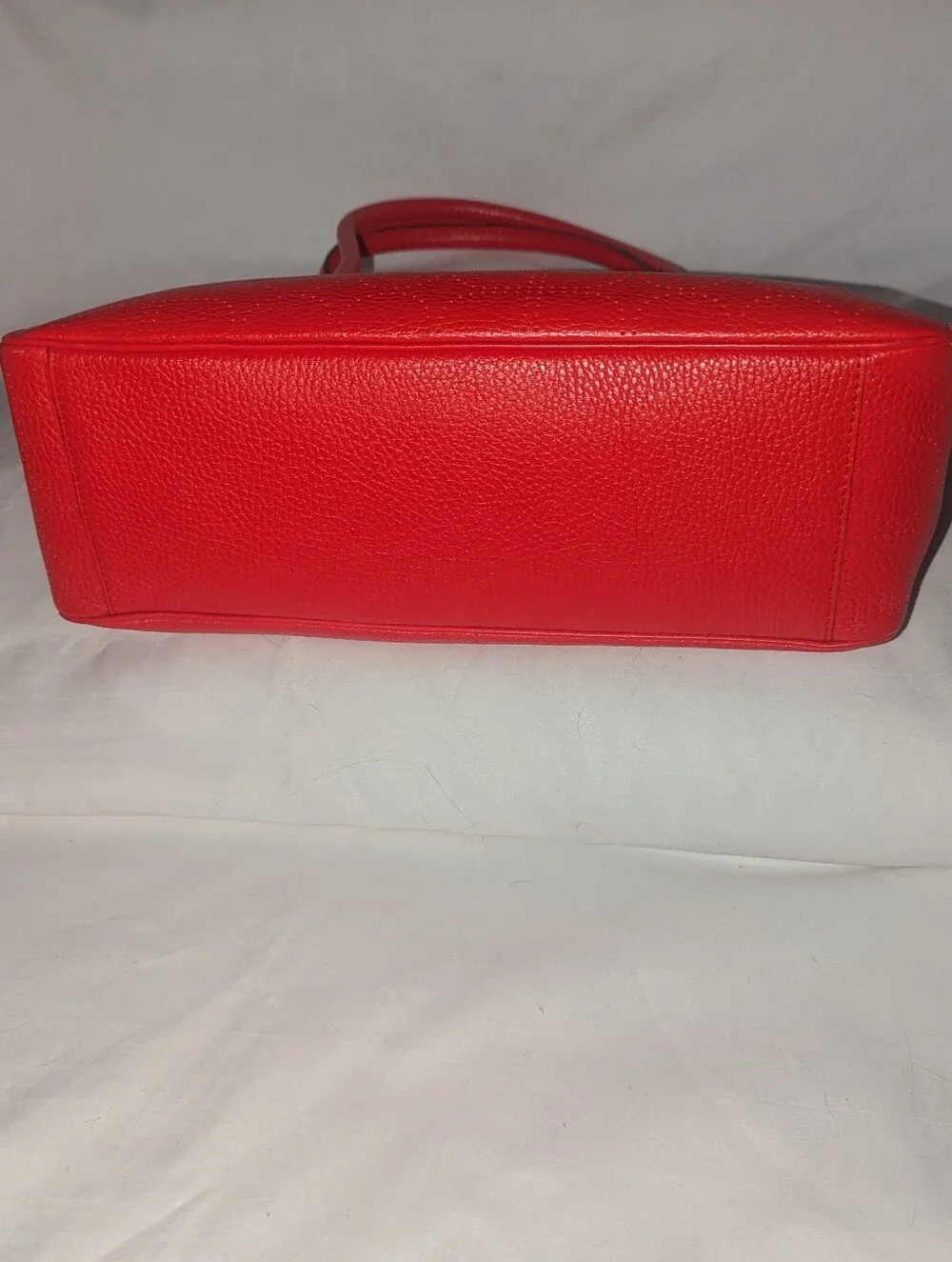 Kate Spade New York  Noel Rue Red Pebbled Perforated Leather Tote Bag.